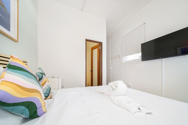 1 bedroom, desk, iron/ironing board, travel cot