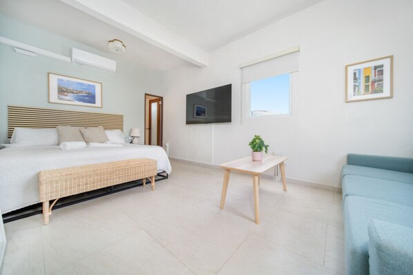 1 bedroom, desk, iron/ironing board, travel crib