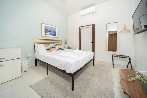 1 bedroom, desk, iron/ironing board, travel crib