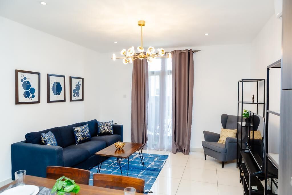 Deluxe Duplex, Balcony | Living area | Computer monitors, printers