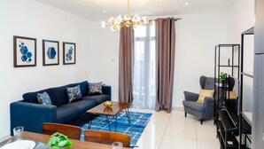 Deluxe Duplex, Balcony | Living area | Computer monitors, printers - PREMIUM SUITE (Accra)