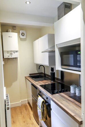 Refrigerador, microondas, horno, placa de cocina