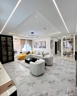 Deluxe Apartment, Balcony, City View | Living area