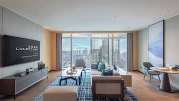 Suite, 1 King Bed, River View | 1 bedroom, down comforters, minibar, in-room safe