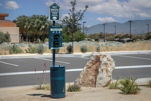 A pet waste station with a sign indicating it is for pet waste and to keep the area clean. - Towneplace Suites By Marriott Palmdale (Palmdale)