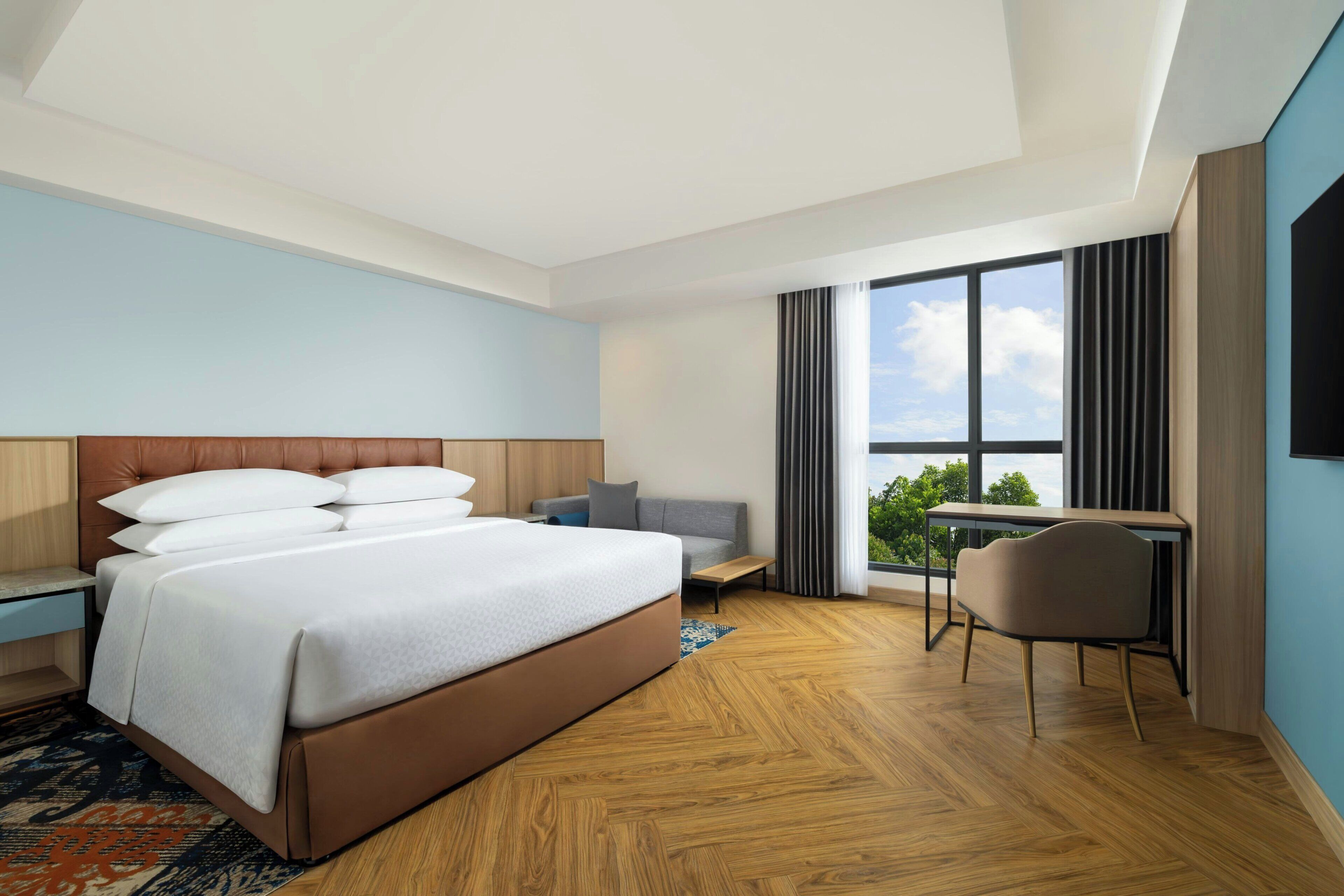 Suite, 1 King Bed, City View | Premium bedding, minibar, in-room safe, desk