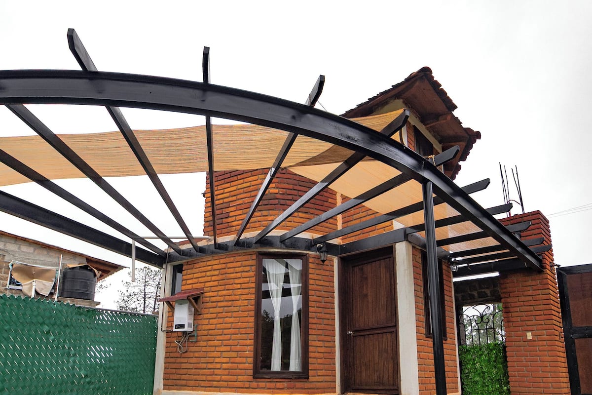 Junior Cottage, Patio, Courtyard View | 2 bedrooms, hypo-allergenic bedding, down duvets, laptop workspace