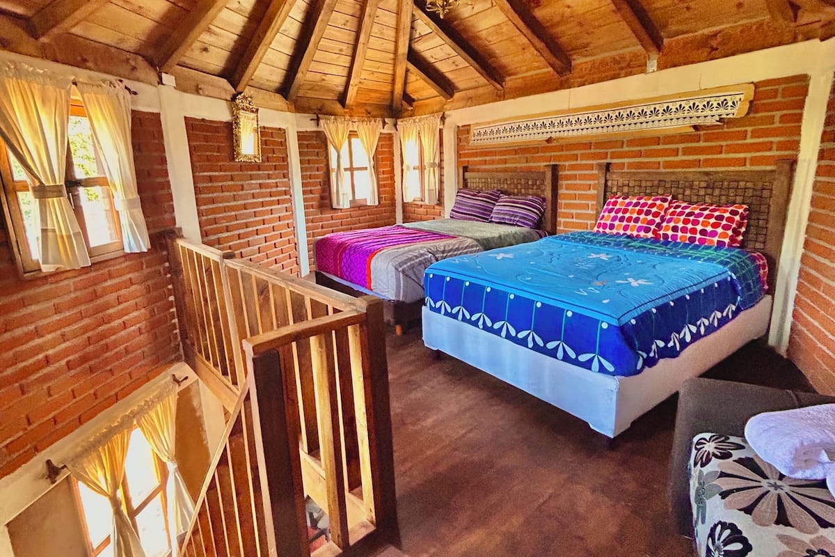 Junior Cottage, Patio, Courtyard View | 2 bedrooms, hypo-allergenic bedding, down comforters, laptop workspace