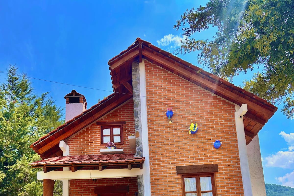 Standard Cabin, Patio, Mountain View | 2 bedrooms, hypo-allergenic bedding, down comforters, laptop workspace