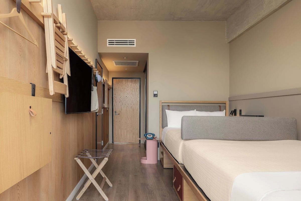 Room, 2 Queen Beds | In-room safe, individually decorated, individually furnished, desk