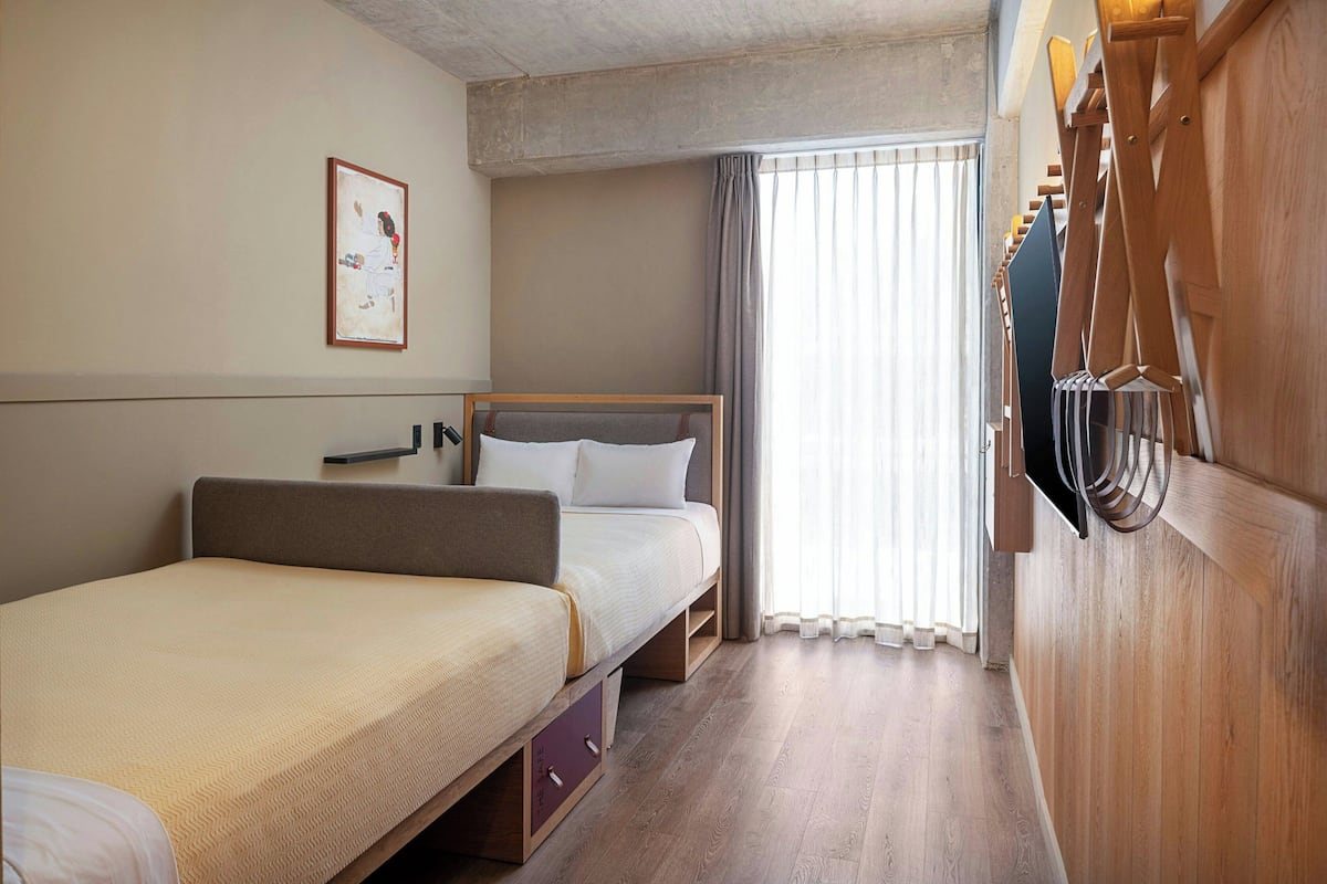 Room, 2 Queen Beds | In-room safe, individually decorated, individually furnished, desk