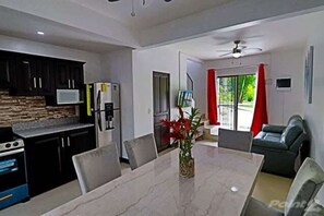 Apartment, Balcony, Garden View | Dining room