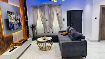 Family Apartment, Balcony, City View | Living area