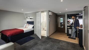 Blackout drapes, iron/ironing board, free WiFi