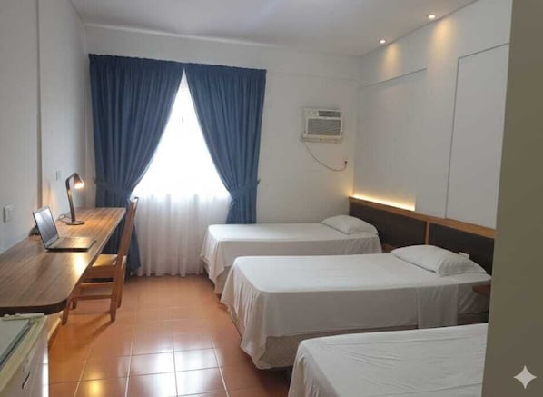 Economy Triple Room, 3 Twin Beds | Free WiFi
