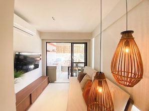 Deluxe Apartment | Living area | Flat-screen TV - Mirante de Porto - Porto de Galinhas (Ipojuca)