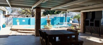 Orchard Guesthouse Deluxe Family Room  with pool view