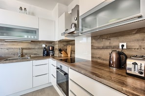 Deluxe-Apartment, Strandblick | Eigene Küche