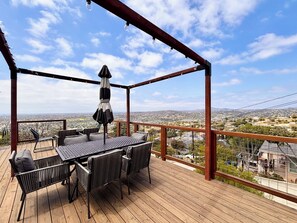 Outdoor dining - Mountain Top 4 Bdrm Home Along Nature Reserve with Spectacular Views, AC & WiFi (Spring Valley)