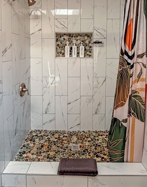 Shower, hair dryer, towels, soap