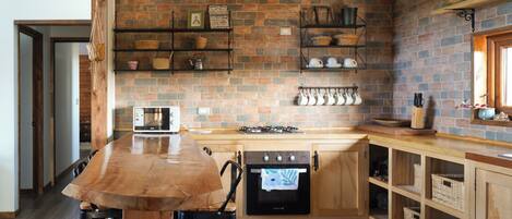 Villa | Private kitchen | Microwave, oven, cookware/dishes/utensils