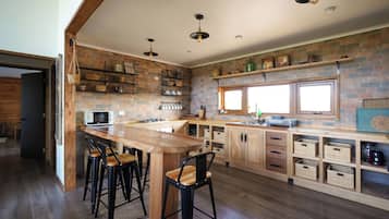 Villa | Private kitchen | Microwave, oven, cookware/dishes/utensils