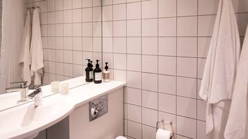 Shower, towels, soap, shampoo