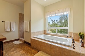 Shower, jetted bath, towels