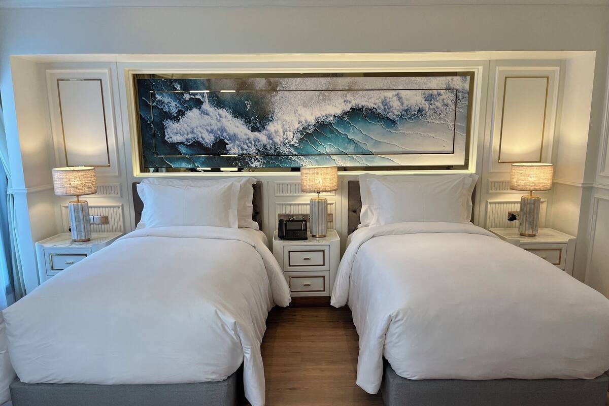 Superior Twin Room | 1 bedroom, blackout drapes, iron/ironing board, free WiFi