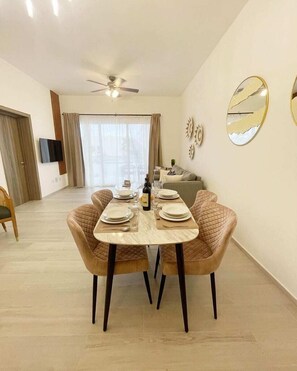 Deluxe Apartment, Balcony, Garden View | Living area | Flat-screen TV - Hard Rock Punta Cana Coral Bay II (Punta Cana)