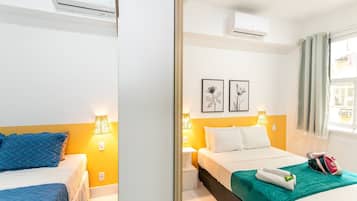 2 habitaciones, tabla de planchar con plancha, internet y ropa de cama