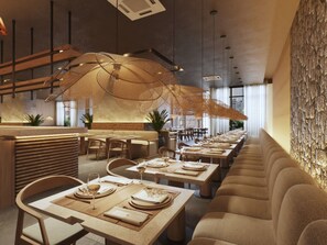 Enjoy a warm and inviting atmosphere in our restaurant, where natural and industrial elements blend seamlessly.