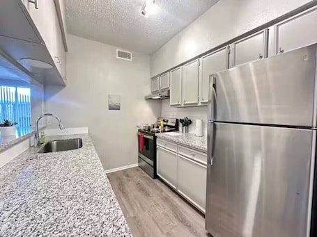 Fridge, microwave, oven, stovetop