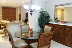 Apartment, Balcony, Garden View | Dining room - Ground-floor unit in front of lazy river pool at Pacifico in Coco (Coco)