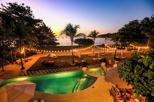 Ground-floor unit in front of lazy river pool at Pacifico in Coco