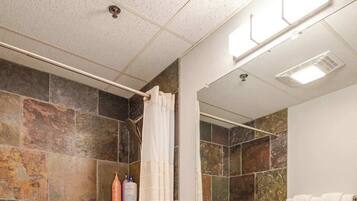 Regadera y secadora de cabello