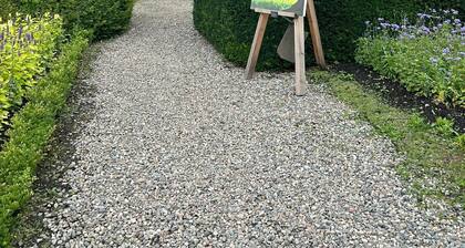 Cosy yet spacious property with private parking, close to the village centre.