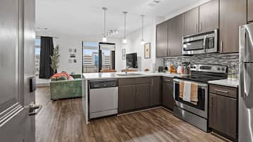 Fridge, dishwasher, coffee/tea maker, dining tables
