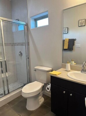 Hair dryer, towels, soap, toilet paper
