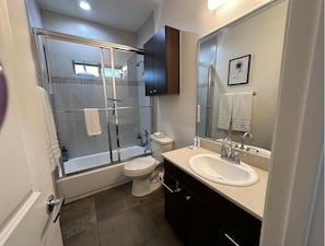 Hair dryer, towels, soap, shampoo
