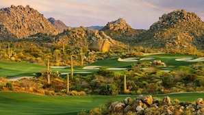 A desert golf course with rocky terrain and cacti. - Troon North Private Pool & Spa (Scottsdale)
