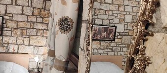 Το Erymanthos country home είναι μια πέτρινη μεζονέτα για στιγμές χαλάρωσης
