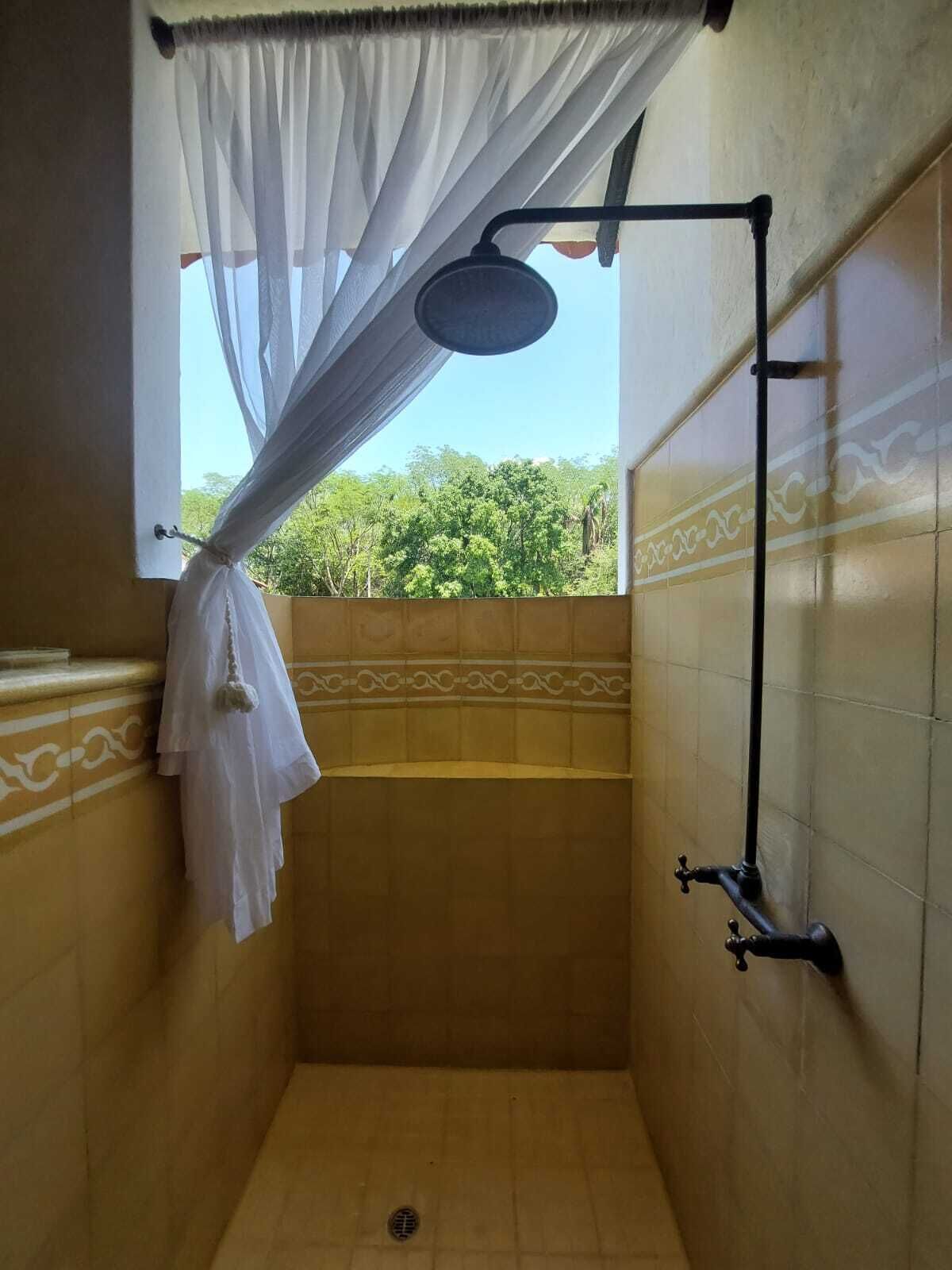 Shower, towels, soap, toilet paper