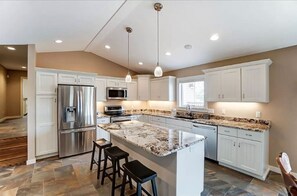 Fridge, microwave, oven, stovetop - Luxurious Waterfront Family Retreat on Crooked Lake, Angola, IN. (Angola)