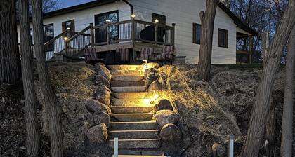 Enjoy beautiful sunsets year round from this spacious 3 BR home on Lake Orono.
