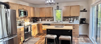 Enjoy beautiful sunsets year round from this cozy 3 bedroom home on Lake Orono.