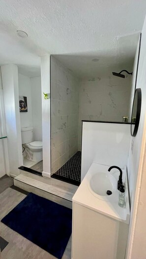 Shower, towels, soap, shampoo