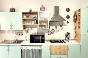 Fridge, microwave, dining tables