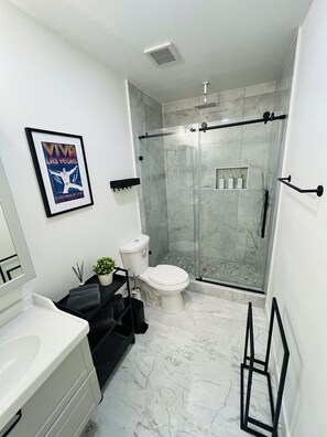 Hair dryer, towels, soap, shampoo