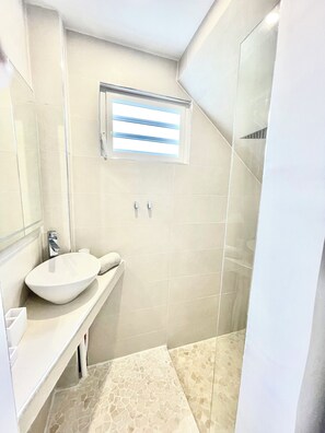 Shower, hair dryer, towels, soap